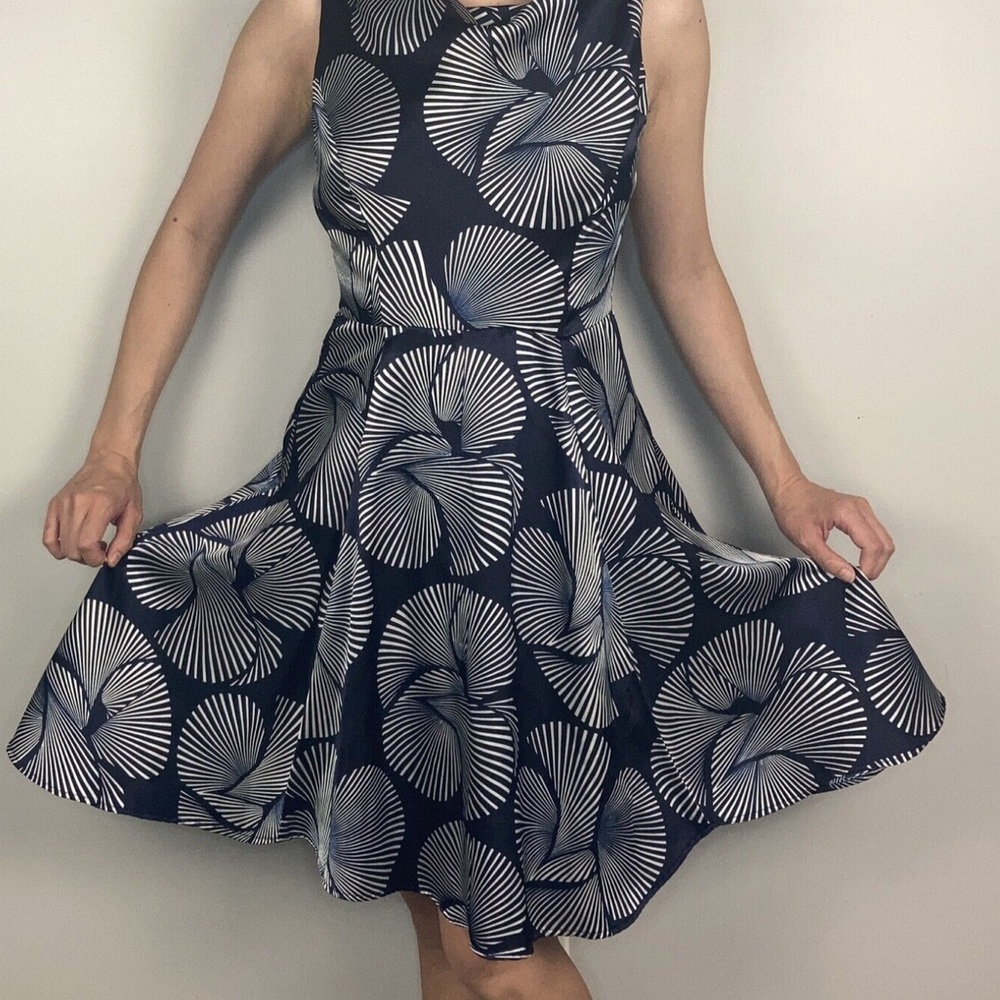 Eva Franco midi dress sleeveless with circle skirt and belt